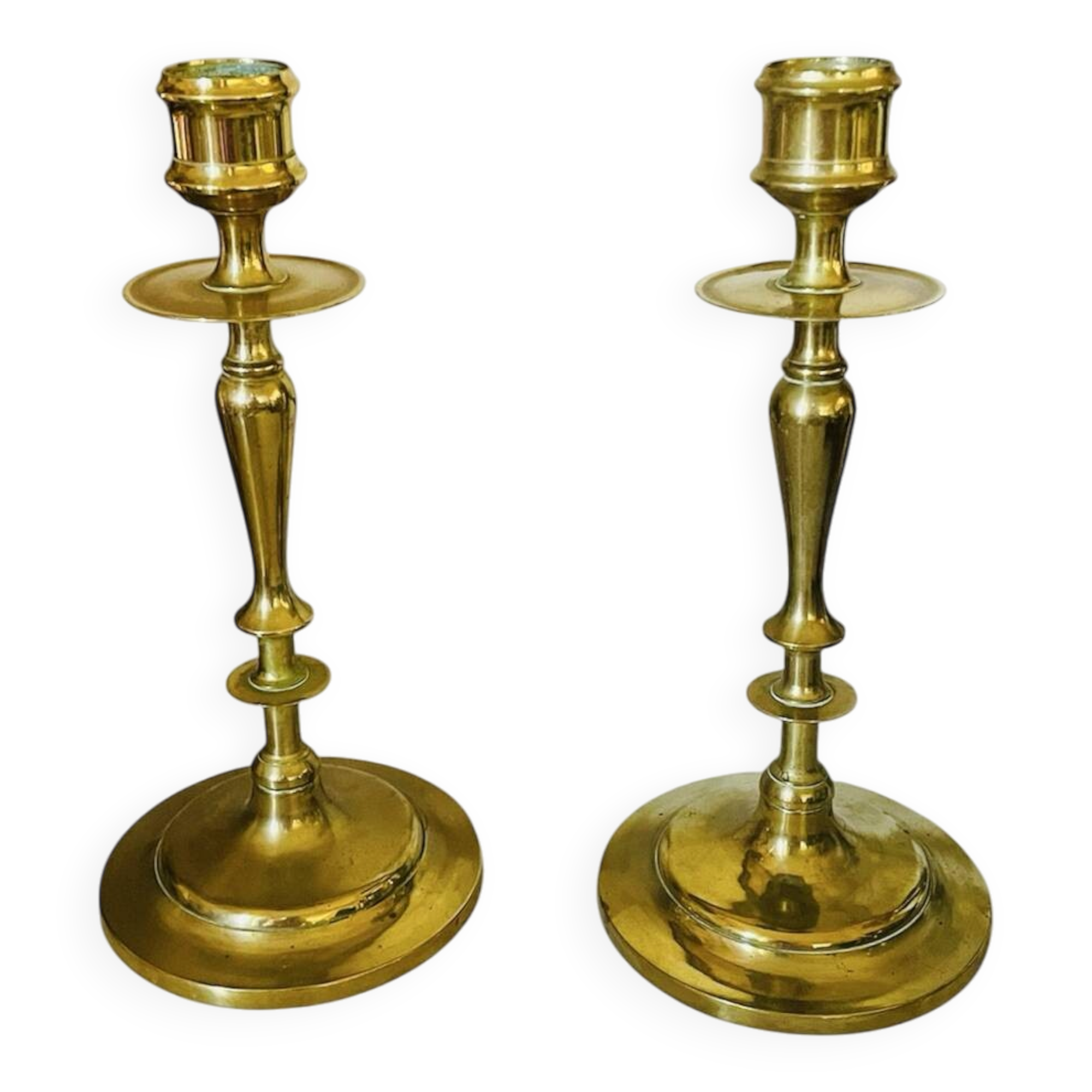Old pair of turned brass candlesticks