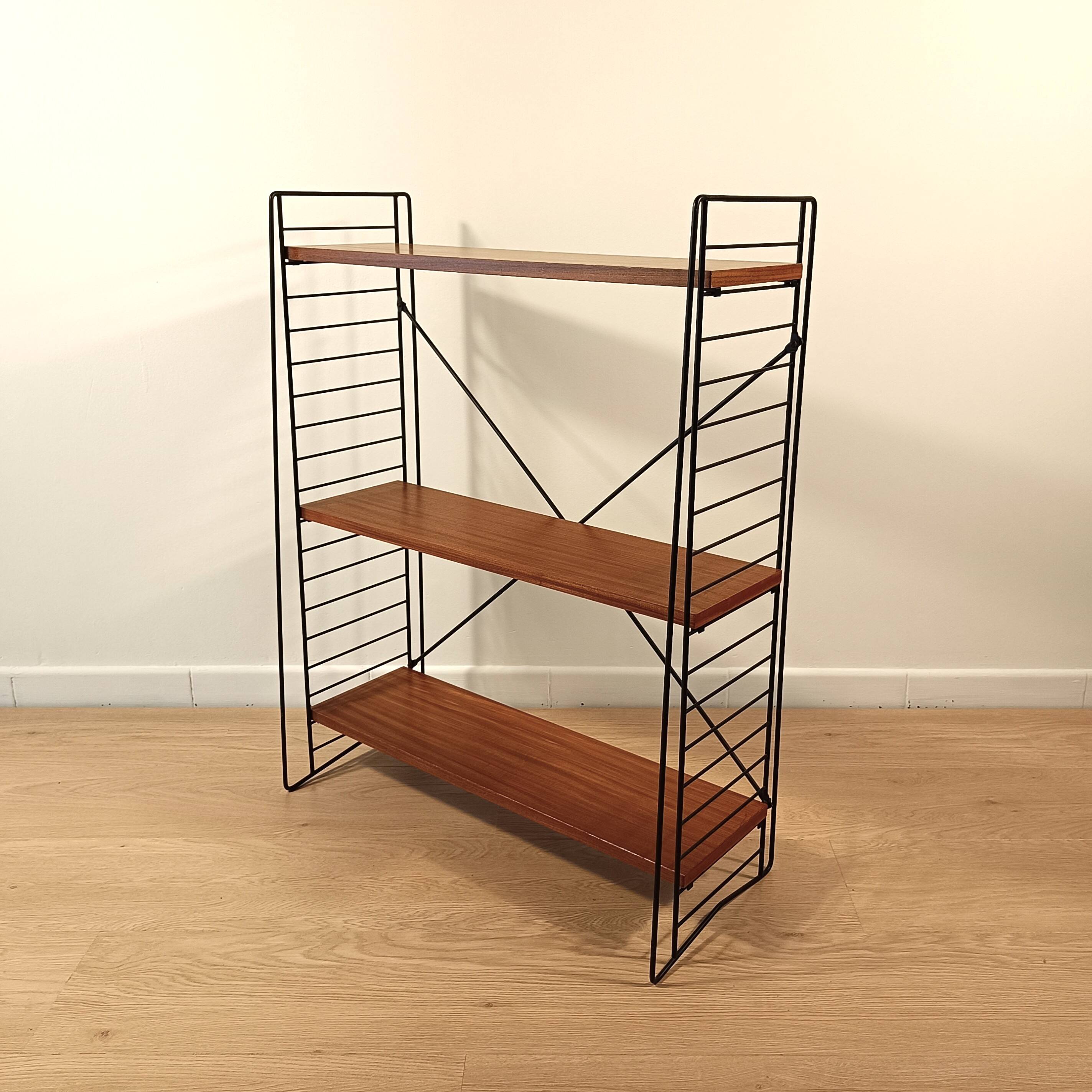 Mid century free standing rack with teak shelves by Dekker – Tomado
