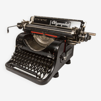 Collectible Olympia 8 typewriter from 1938 overhauled and new ribbon