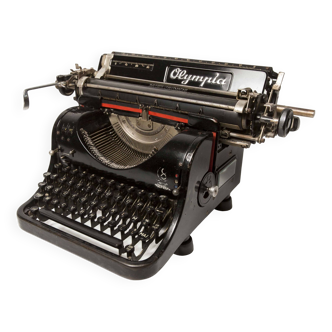 Machine à écrire de collection olympia 8 de 1938 révisée et ruban neuf