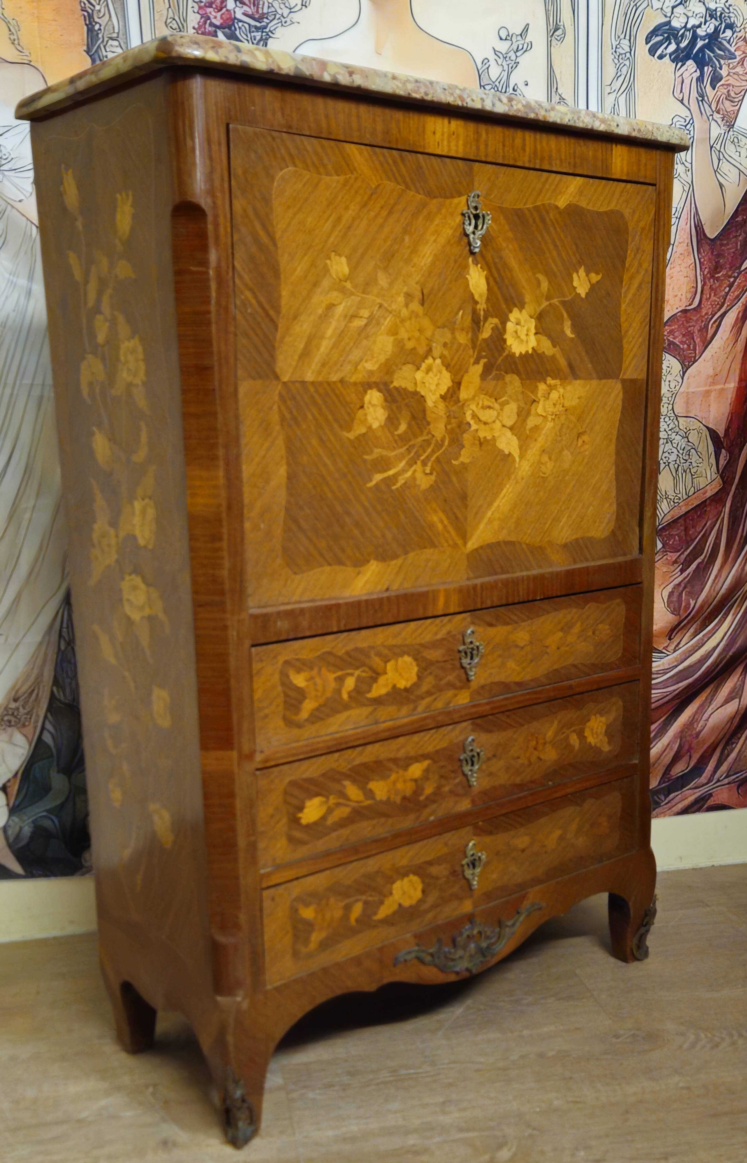 Secretary with a curved drop-leaf in floral marquetry, mid-19th century.