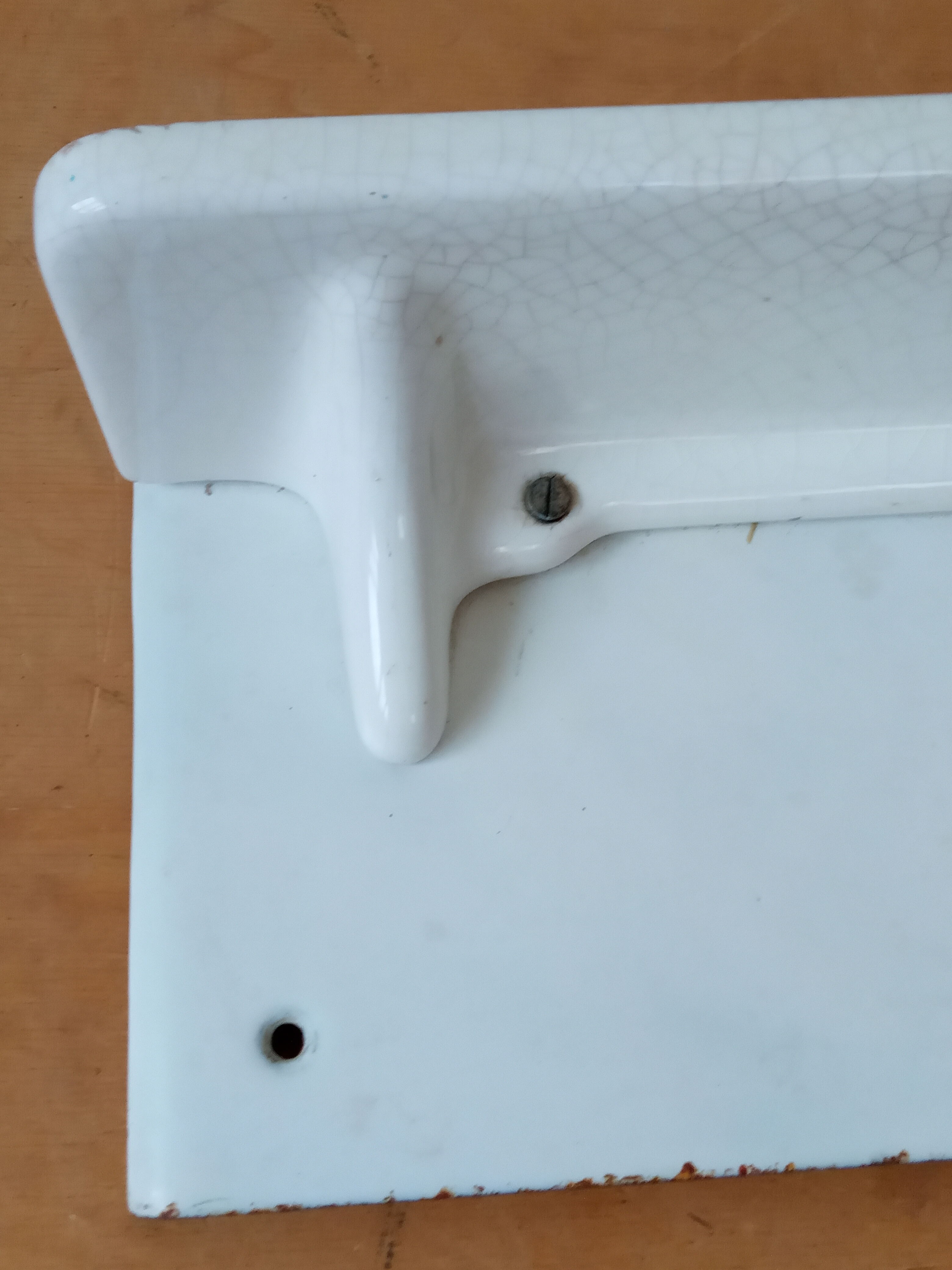 Earthenware shelf and enamelled cast iron