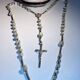 Old mother-of-pearl rosary in its egg box