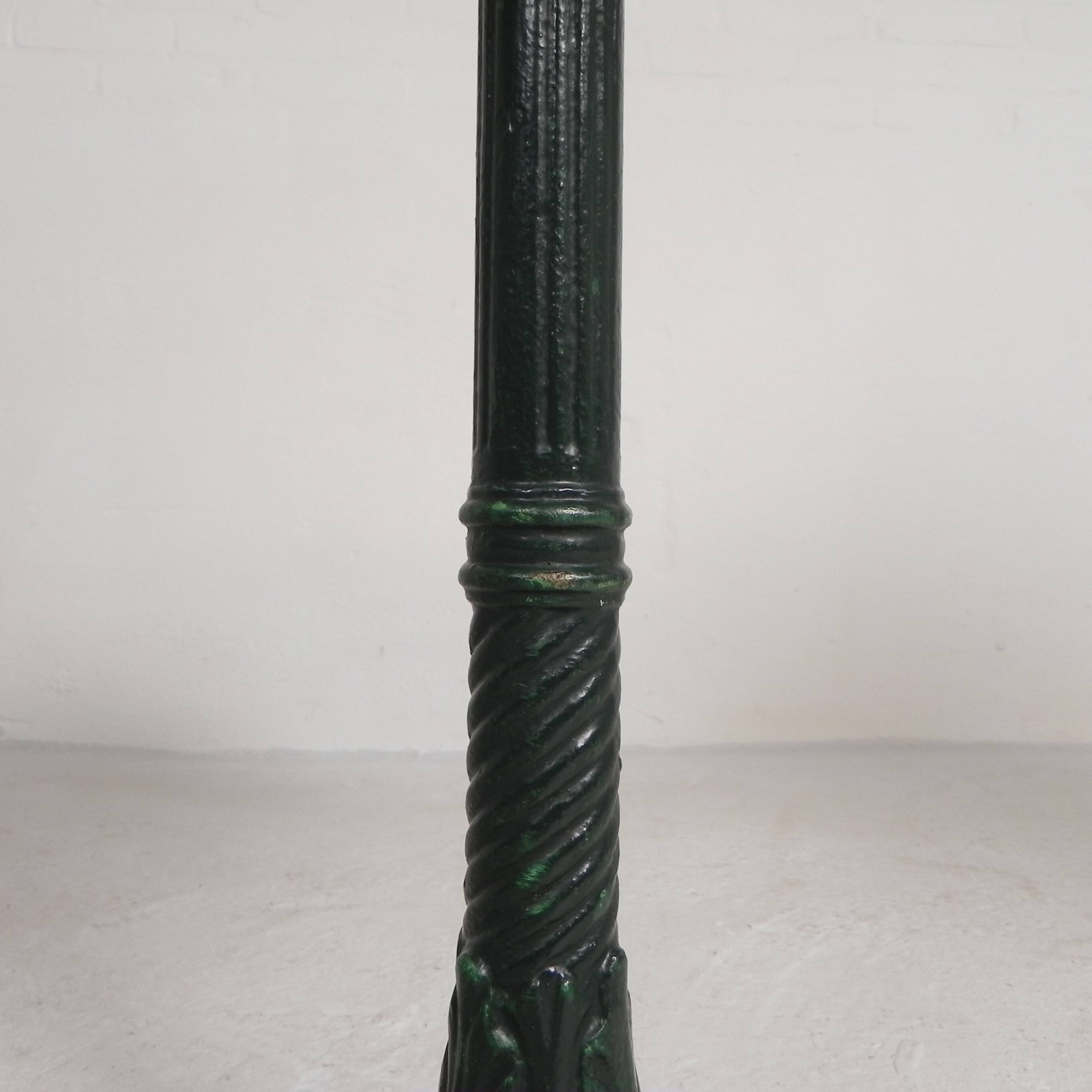 Bistro table with cast iron legs and marble top, 1920s.
