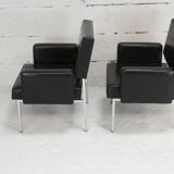 Pair of stainless steel, black leather-like armchairs, France, circa 1970