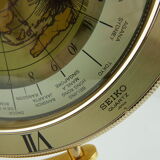 Pendule Seïko mappemonde