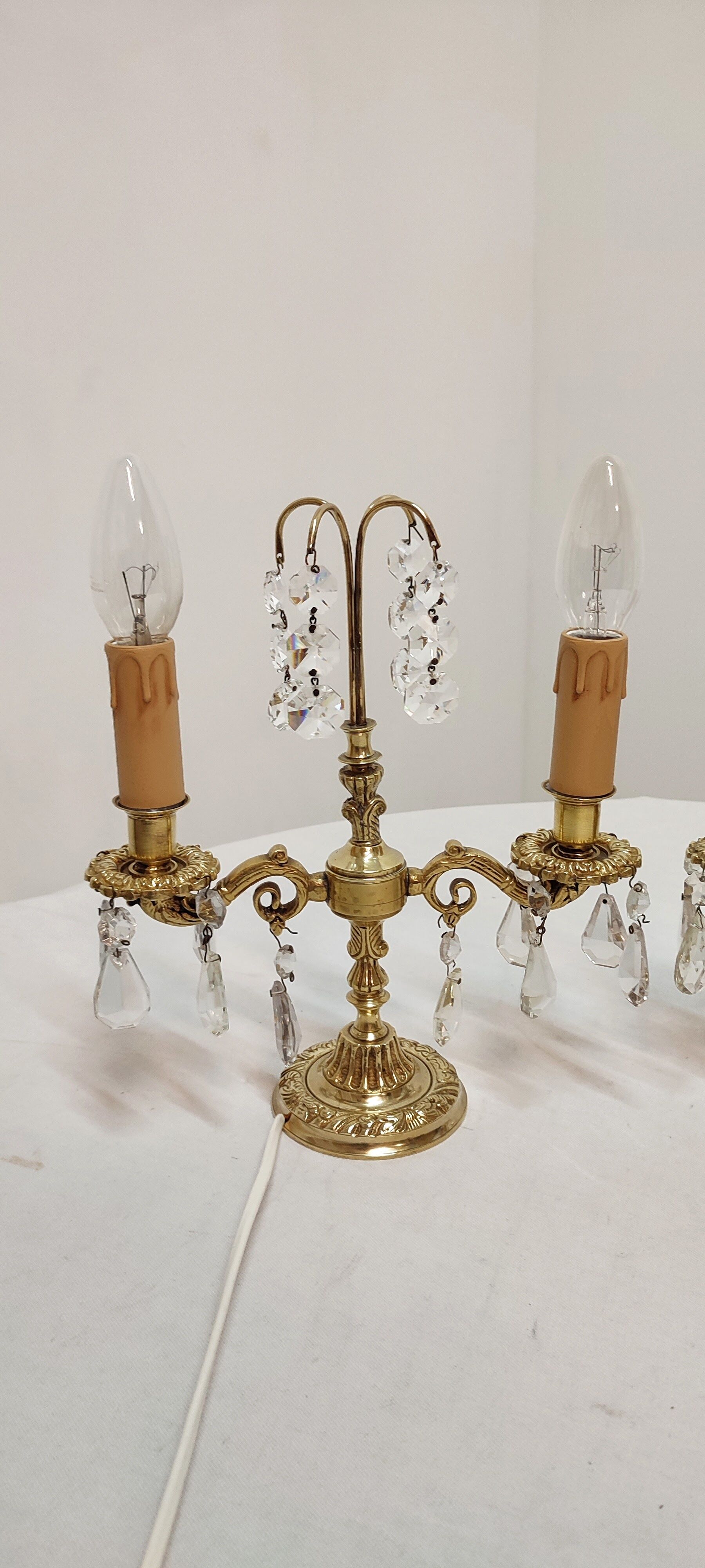Classic bronze and crystal sconces. France 1950s.