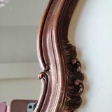 Pretty Baroque style mirror / Louis XV patinated with pink / golden copper reflections. Volutes, leafy shells