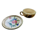 Large cup and saucer in the quimper earthenware style.
