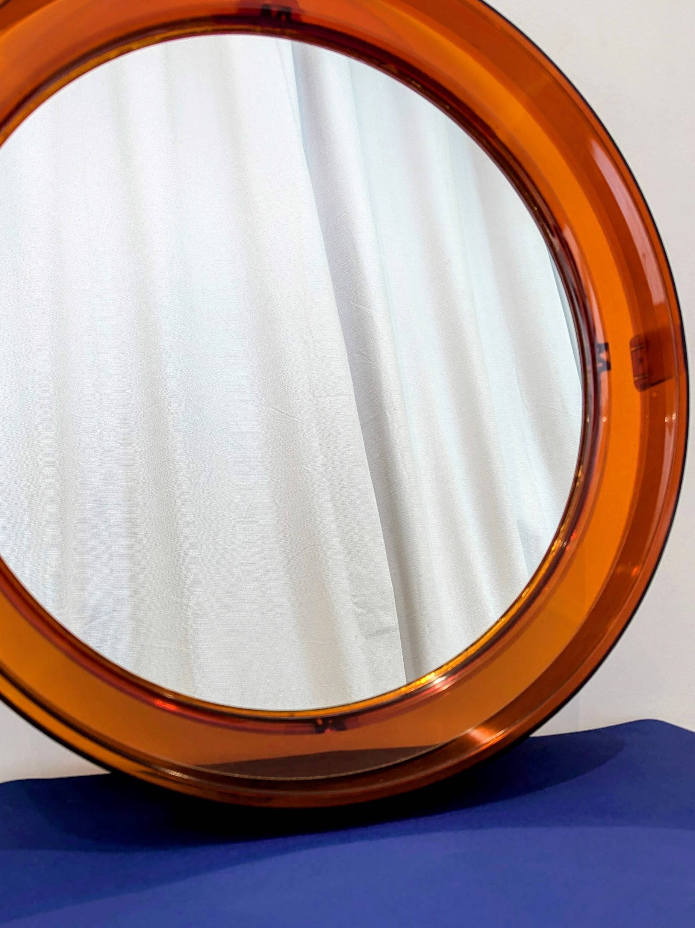 Vintage round orange plexiglass mirror Space Age 1970s