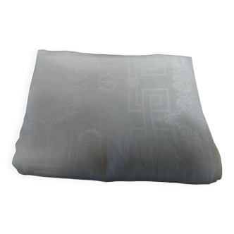 Table napkins set of eleven in a single piece damask linen and silk early 20th century.