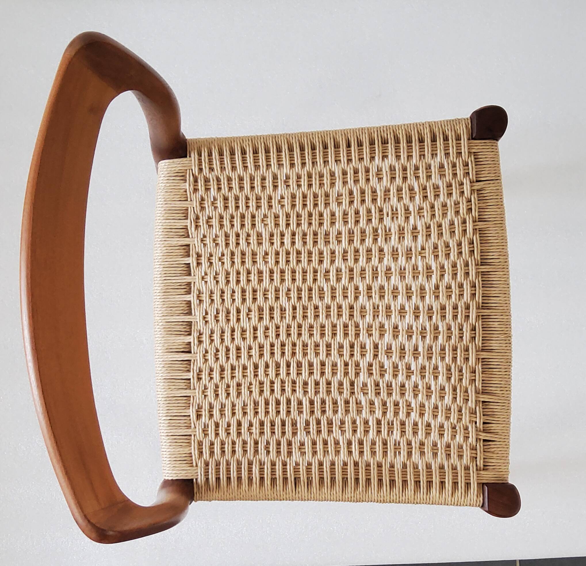 Danish dining chairs in wood and paper cord