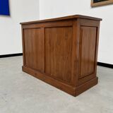Two-sided paneled counter, bottle storage
