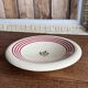 Plat rond creux terre de fer Gien