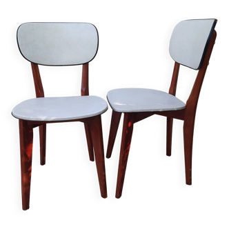 paire de chaises vintage en simili cuir blanc