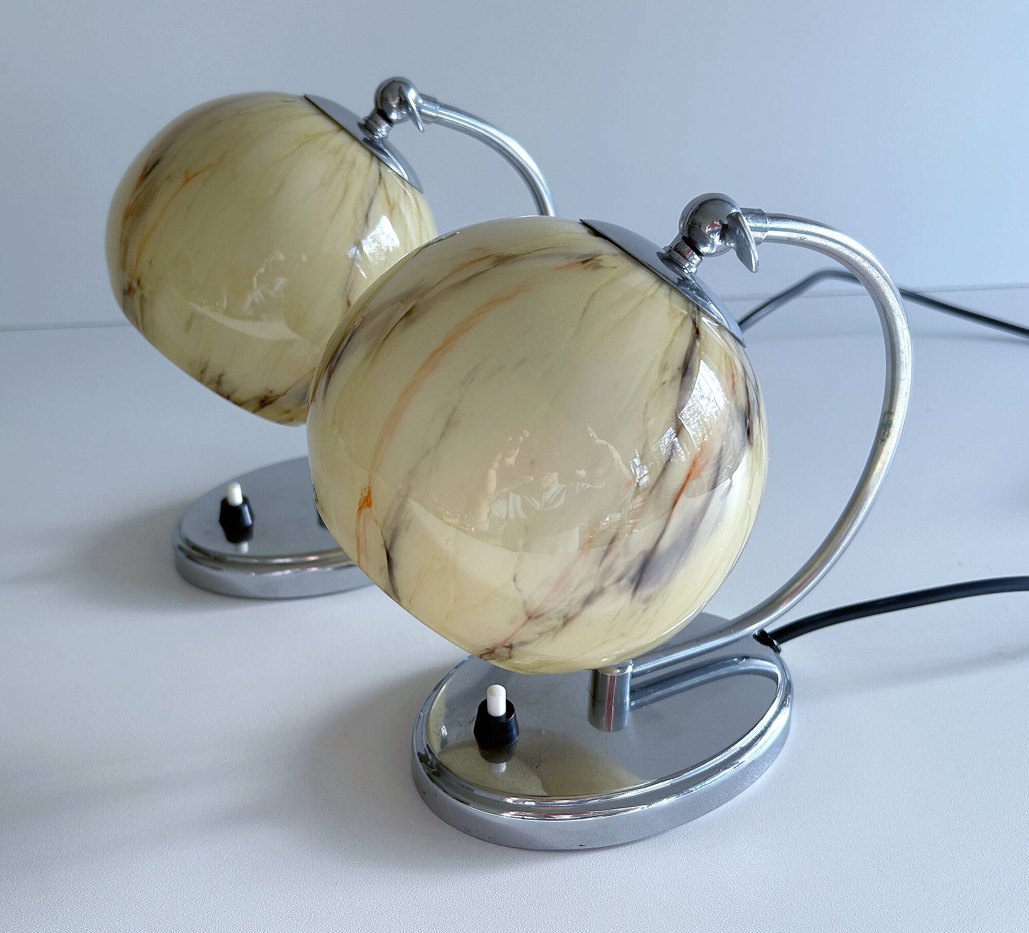 Pair of art deco lamps, chrome glass