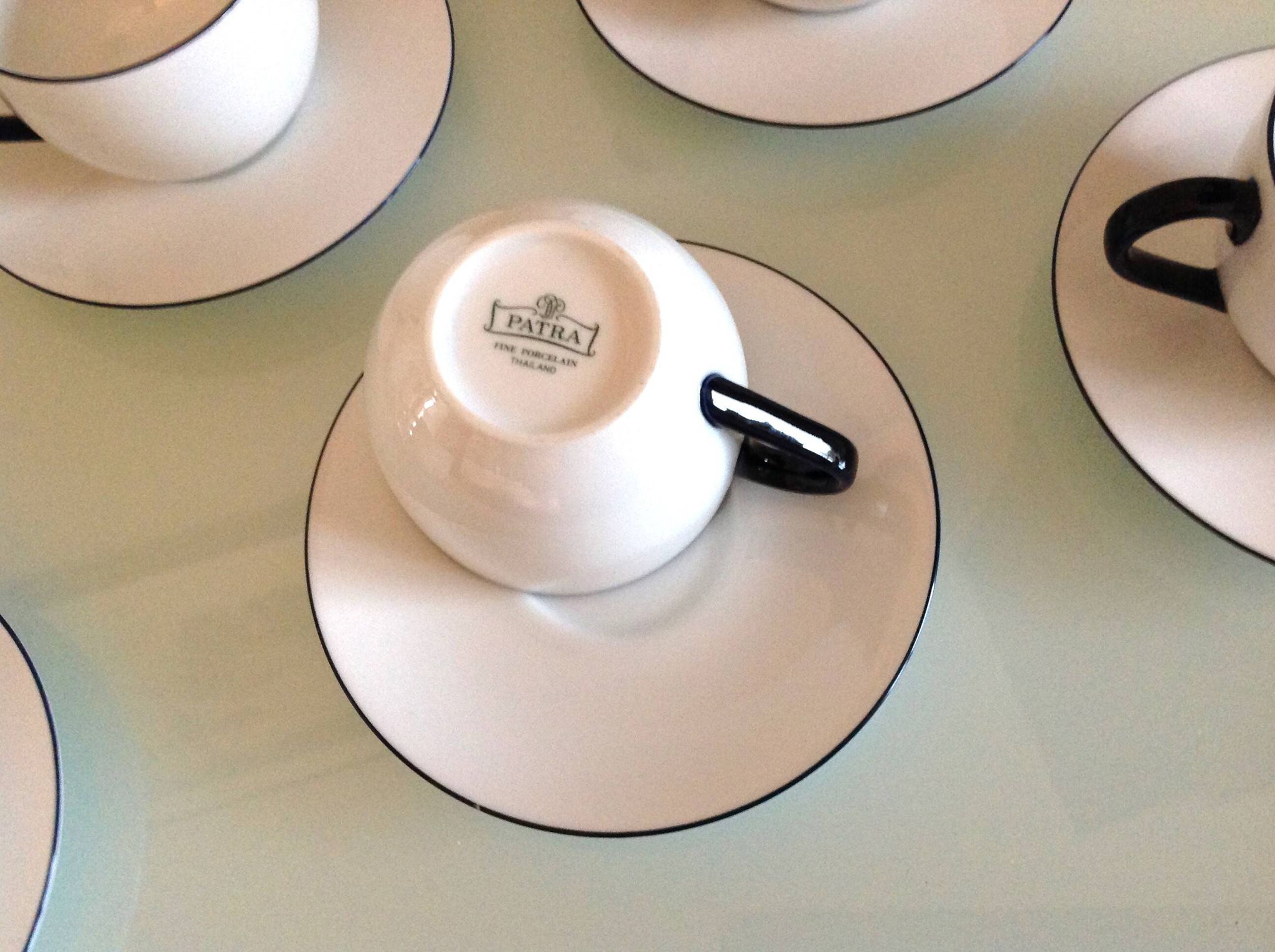 Set of eight white porcelain cups with blue edging / vintage 70s-80s