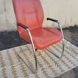 Orange leather cantilever tubular armchair