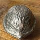 Nutcracker, shaped like a large nut, silver-plated metal