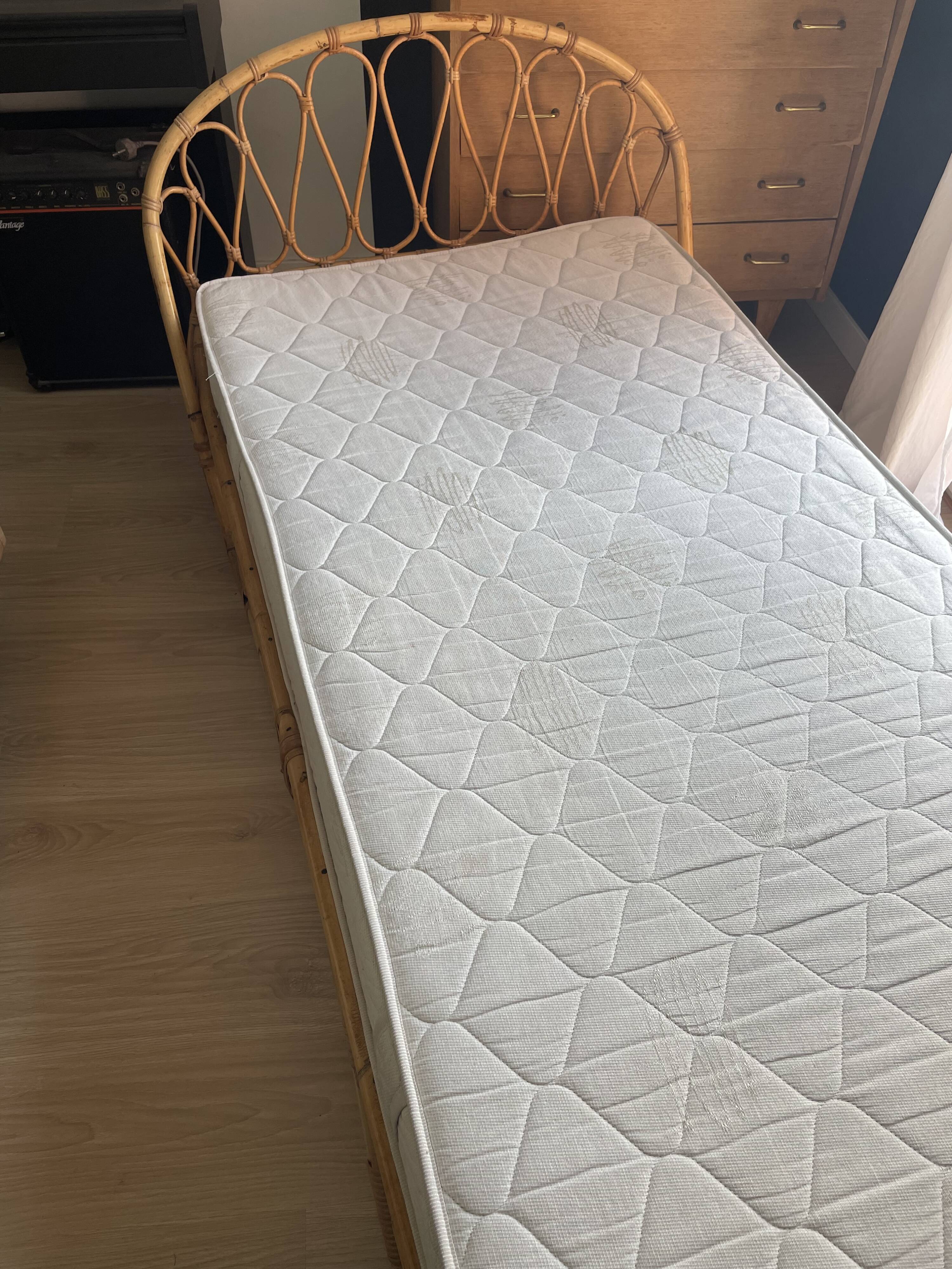 Vintage rattan basket bed