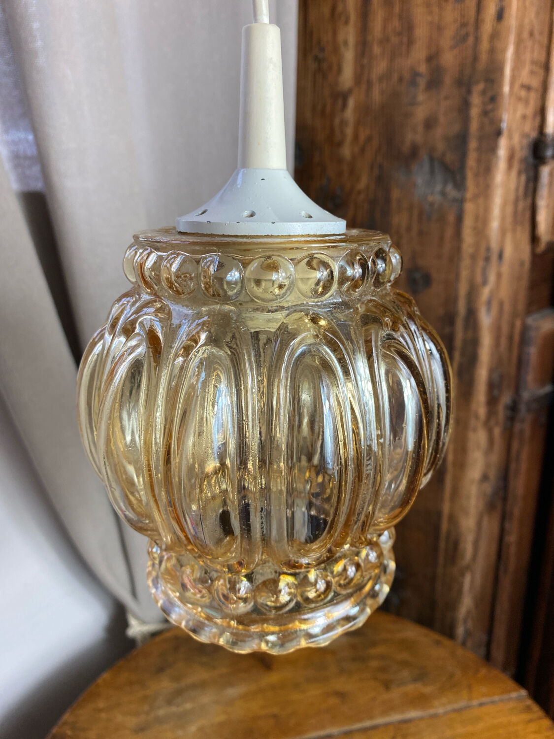 Suspension, baladeuse rétro en verre ambré