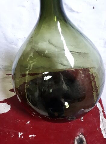 Dark green demijohn