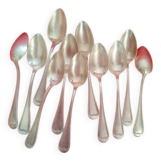 11 Small silver-plated spoons.