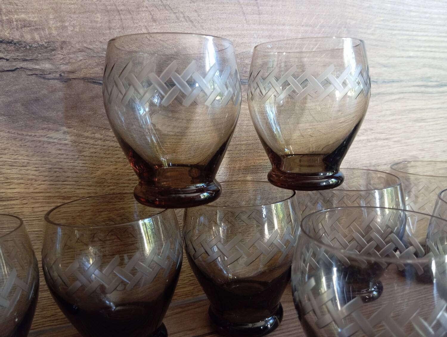 Set of 9 digestive glasses, smoked glass cut in art deco style