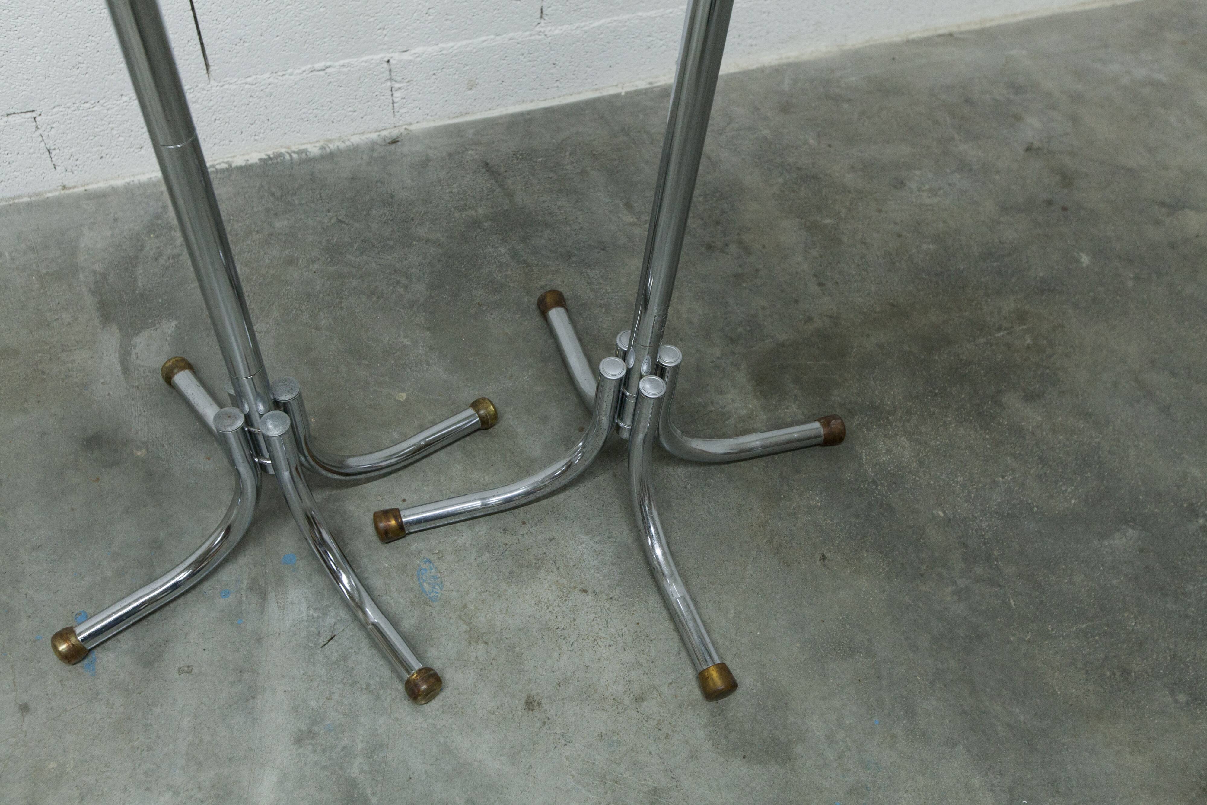 Coat rack with 12 chrome and black plastic hooks, 1960, 2m.