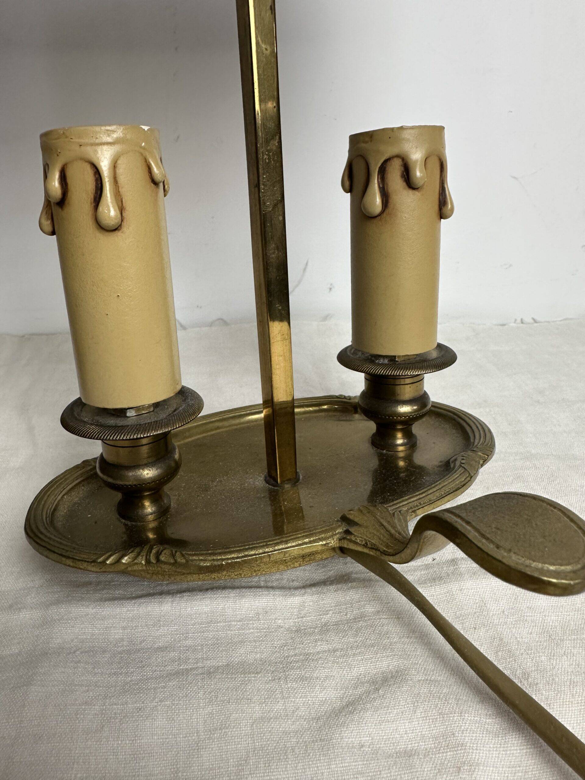A pair of old brass bed warmers.