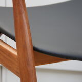 Vintage armchair in teak and black leather model Casina 60s