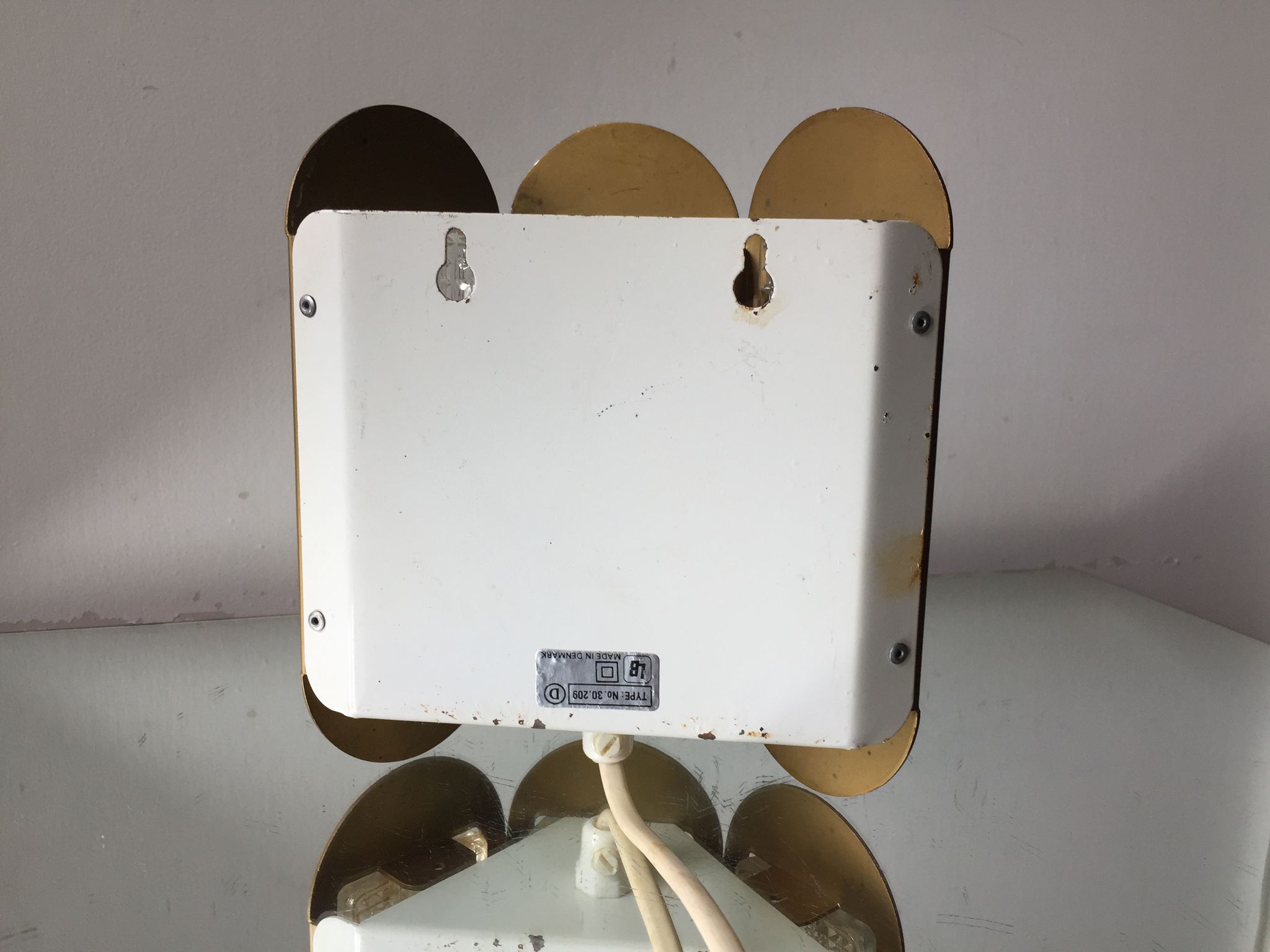 Scandinavian midcentury wall light in crystal and mat gold colored metal