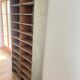 Large antique workshop cabinet with patinated wooden compartments, 20th century.