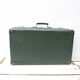 Green antique suitcase