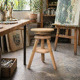1950s solid oak tripod workshop stool with a screw mechanism.