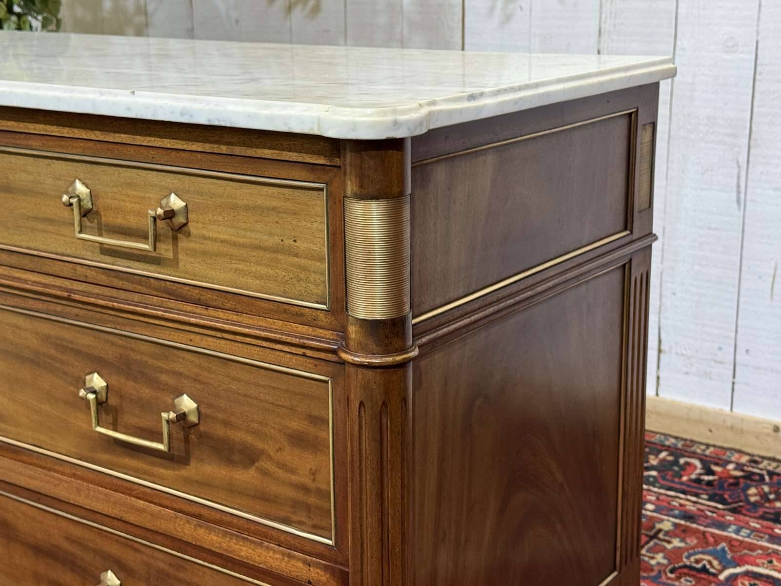 Louis XVI commode in mahogany with a marble top from the 1950s.