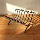 Silver metal cut in imitation of vintage bamboo.