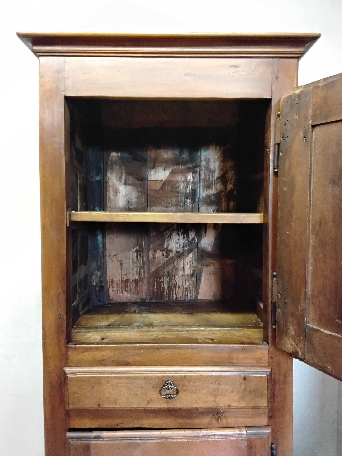 Antique wardrobe standing man
