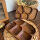 Olive wood platters, in organic shapes.