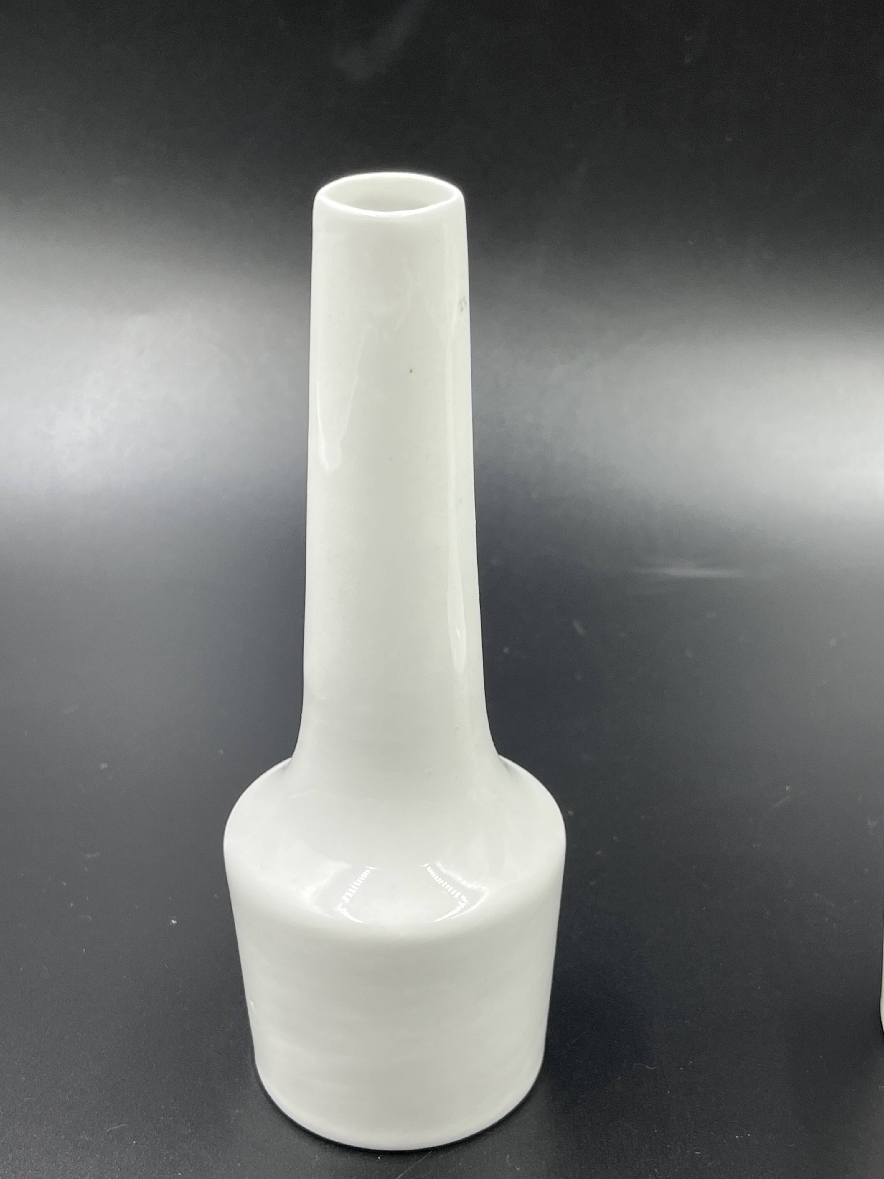 Pair of vintage white ceramic bud vases