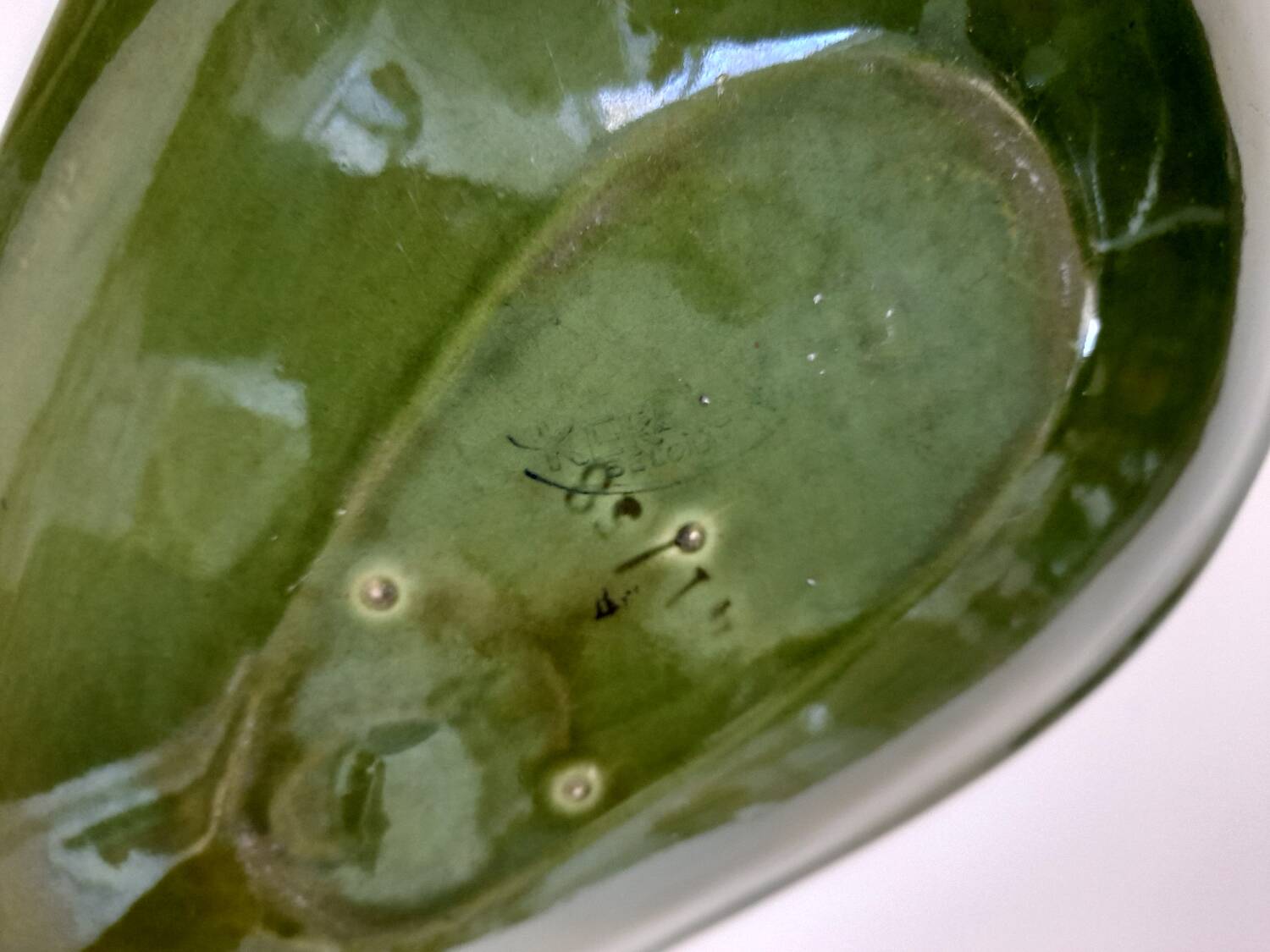 Large olive green Keralux Boch earthenware dish