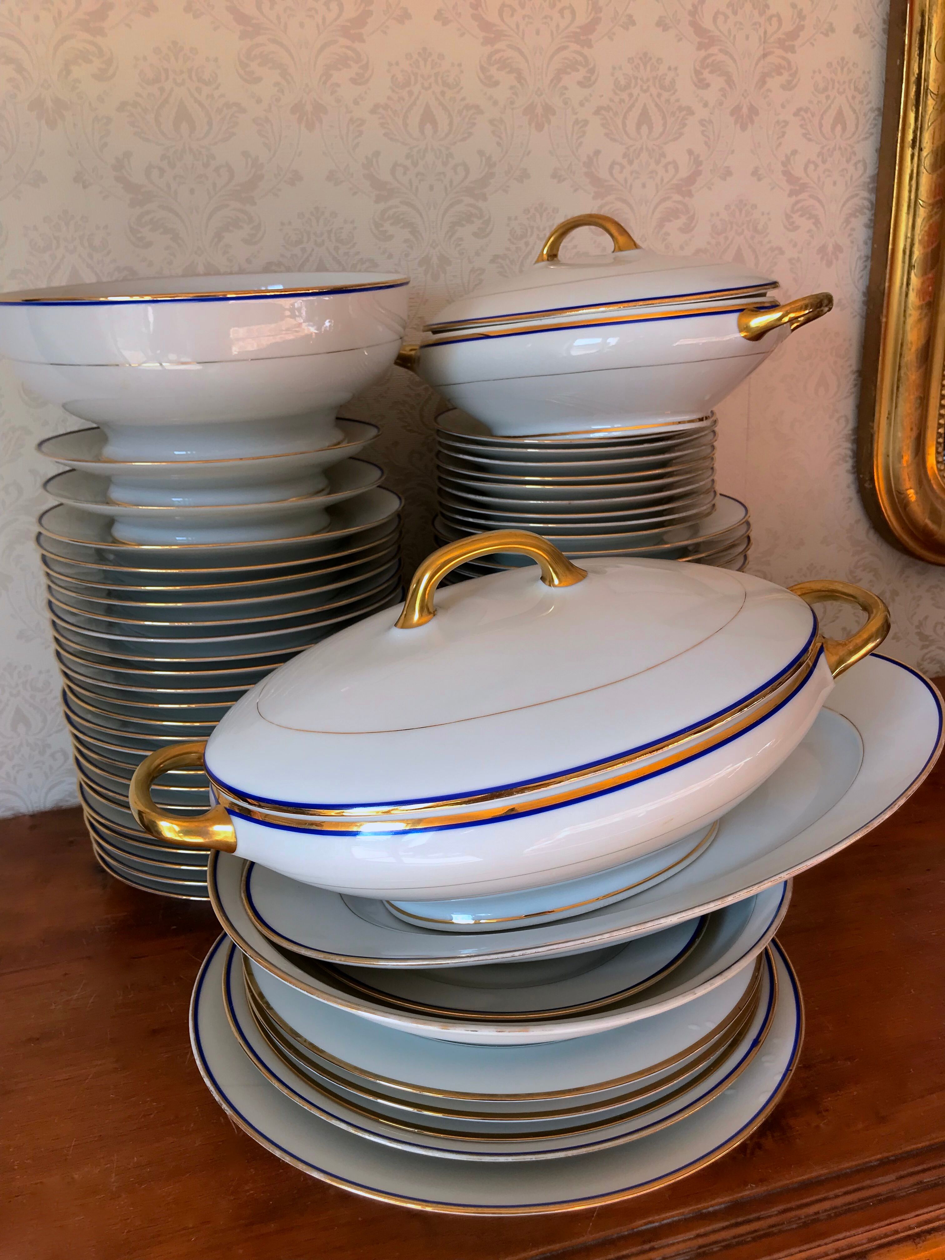table service art deco limoges porcelain white border blue and gold 61 pieces signed