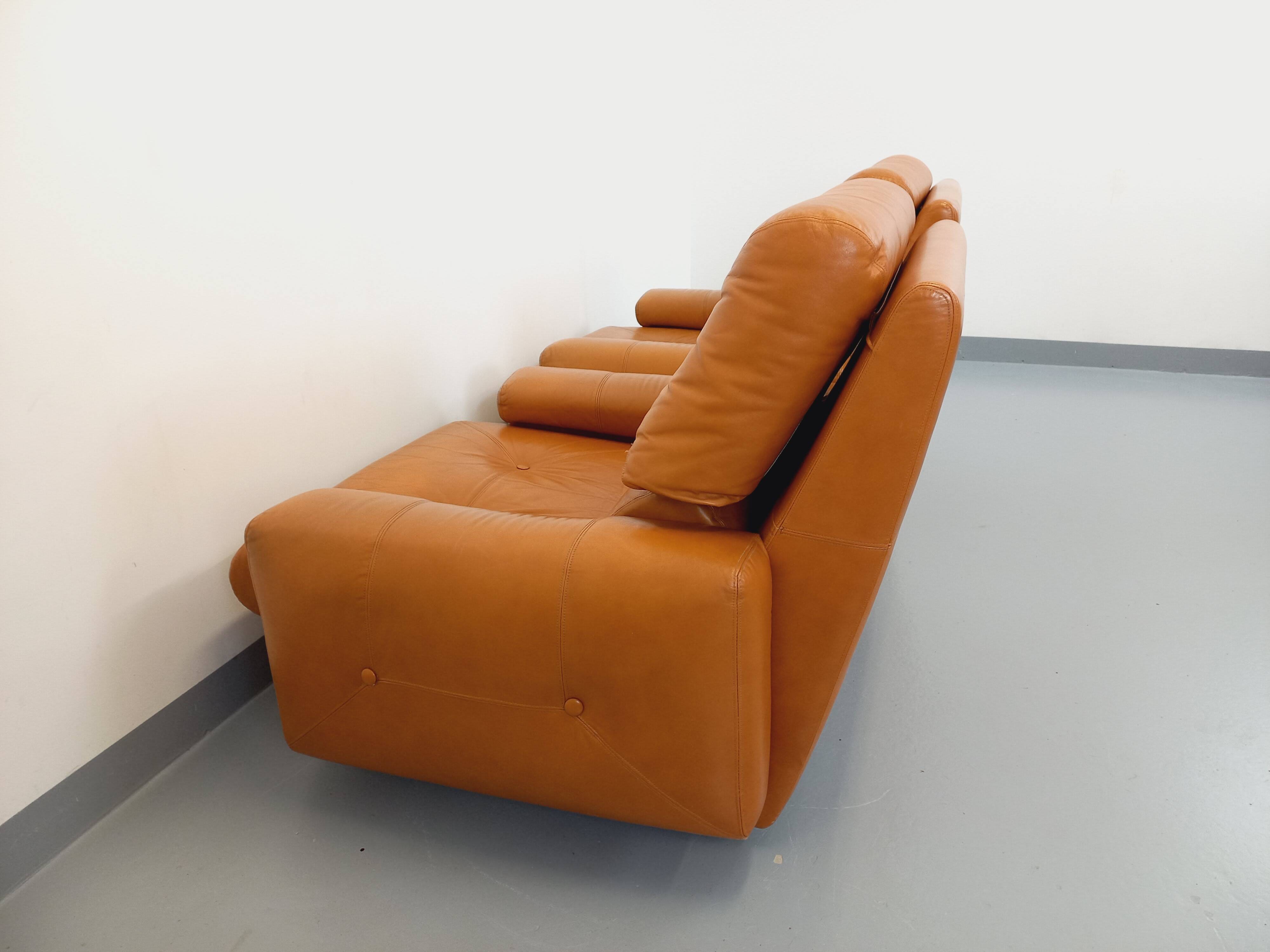 Pair of vintage leather lounge chairs from the 60s and 70s