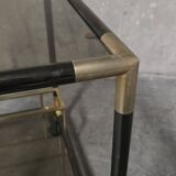 Black metal and brass rolling dessert trolley, smoked glass, 1970s.