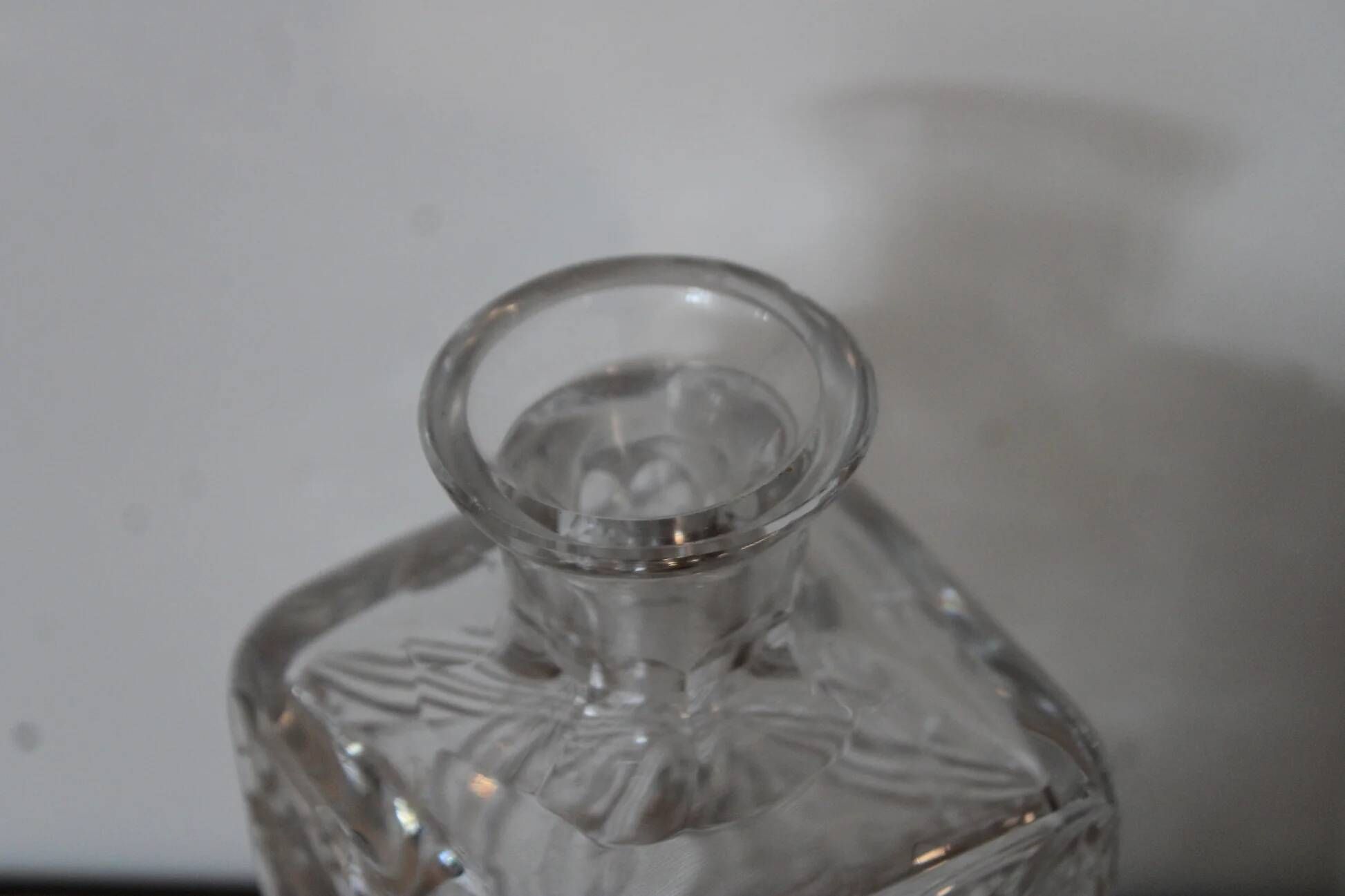 Antique cut glass carafe, probably crystal – Geometric patterns and matching stopper.