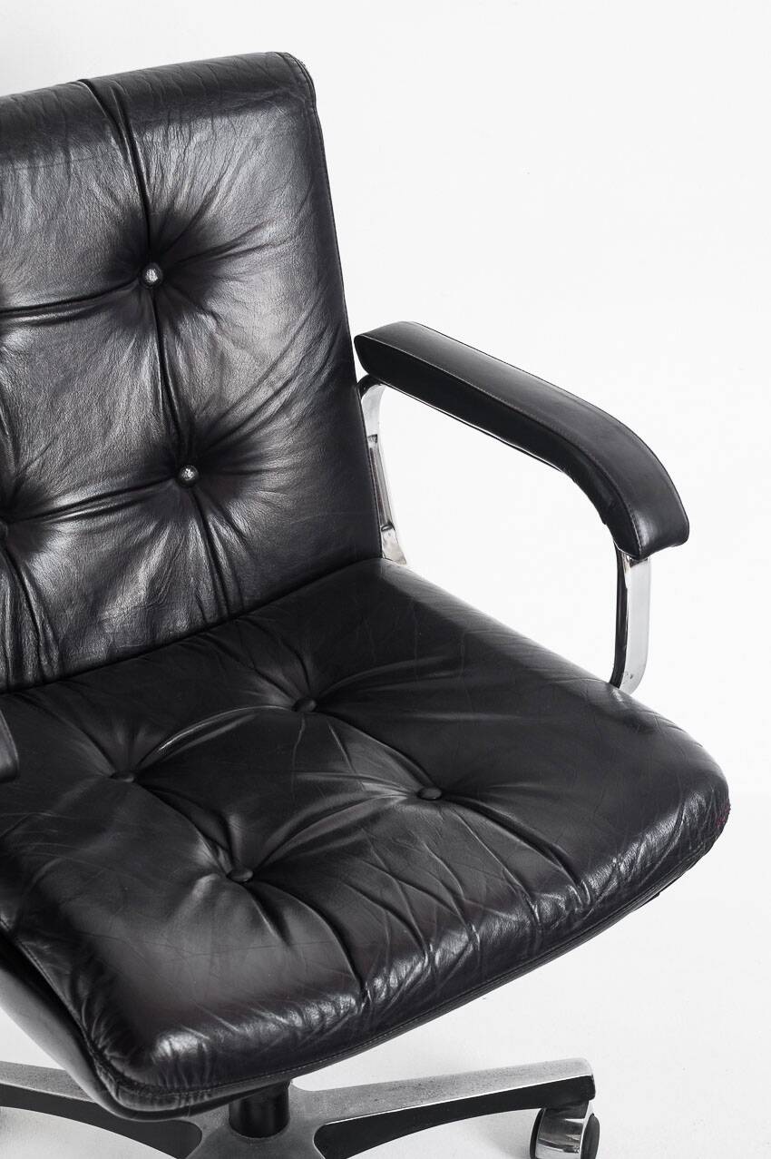 Vintage leather armchair. Swivel, on casters, multi-position. Norway, 1970s.