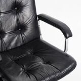 Vintage leather armchair. Swivel, on casters, multi-position. Norway, 1970s.