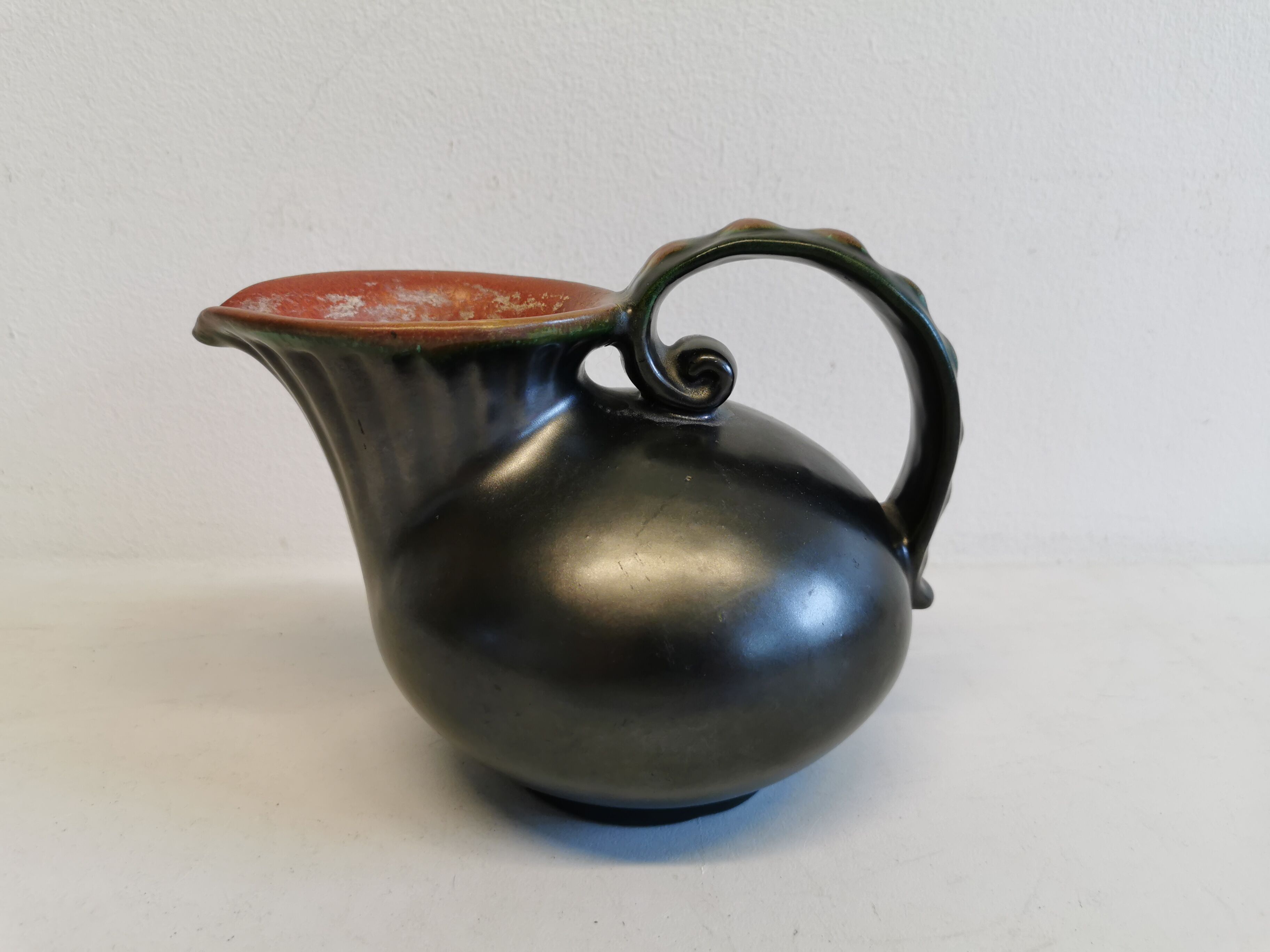 Keramic jug in metal glaze, from Danish Michael Andersen (Stamped with the 3 fish at the bottom)