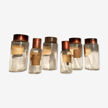Set of 7 jars at old glass pharmacy