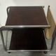 1970s/80s coffee table on casters with metal tubing, light-colored door